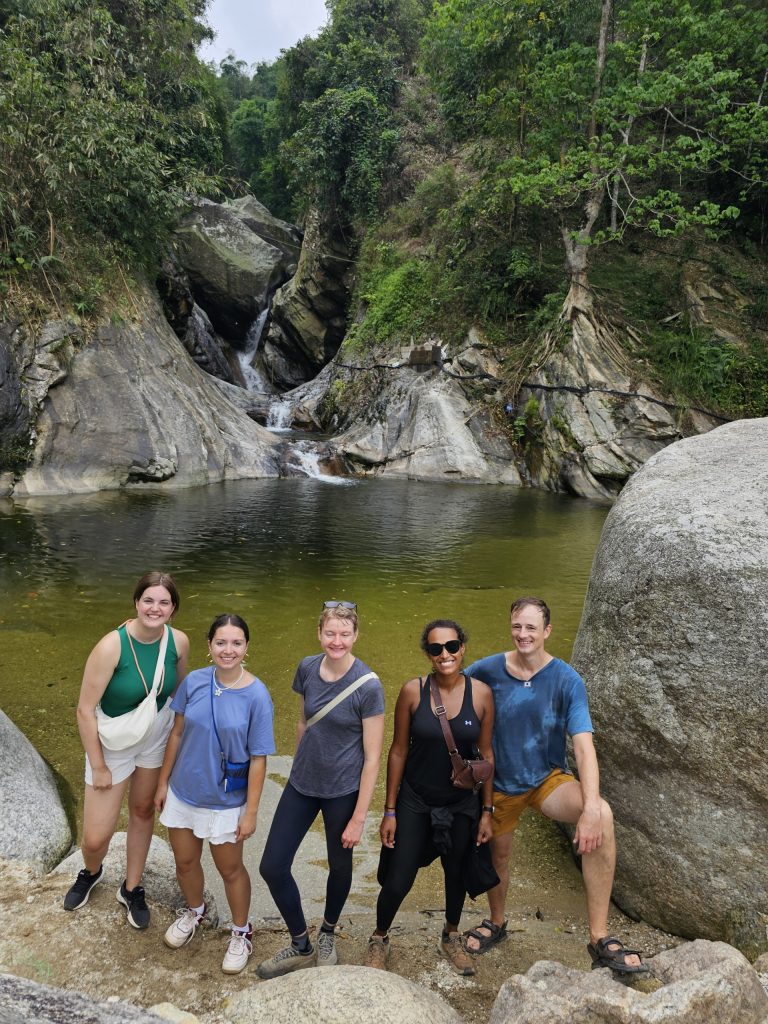 In the waterfall, swim